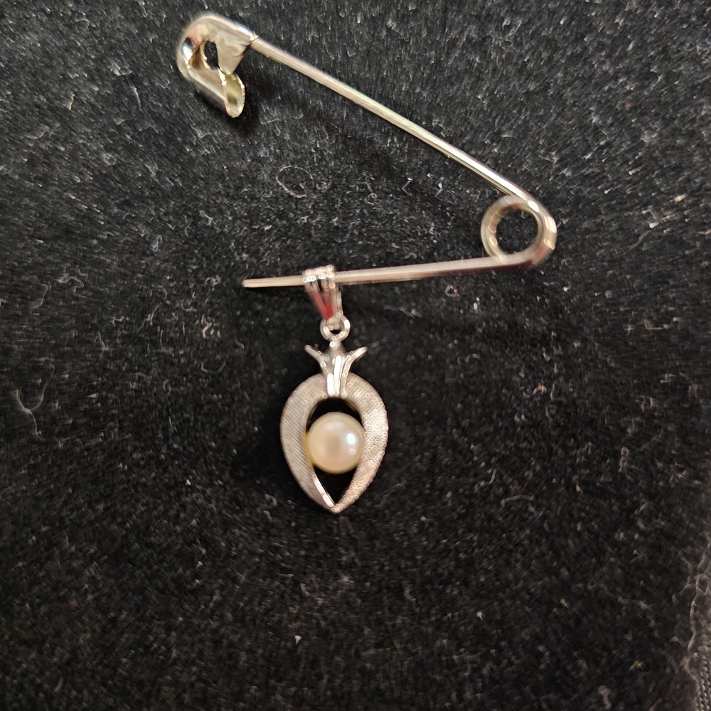 Elegant Silver and Pearl Brooch